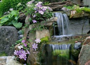 15 Relaxing Backyard Waterfalls Ideas For Your Outdoor 12