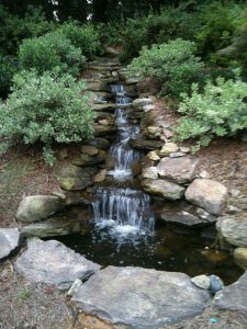 15 Relaxing Backyard Waterfalls Ideas For Your Outdoor 21